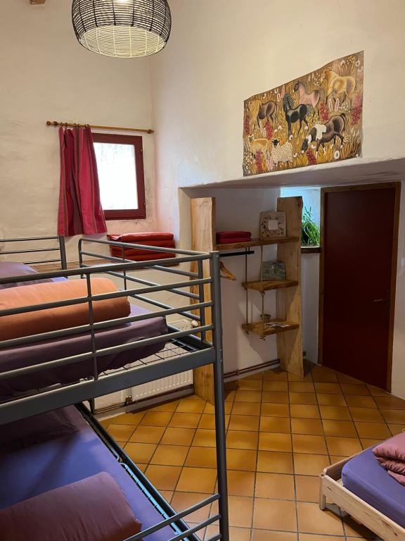 Postel nebo postele na pokoji v ubytování Chambres d'hôtes Gîte Saint Roch