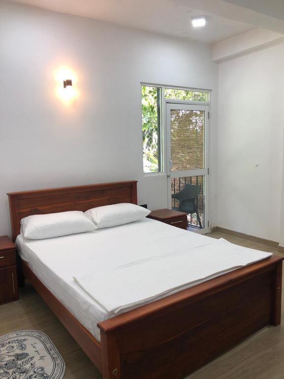 Postel nebo postele na pokoji v ubytování SERENE HOME