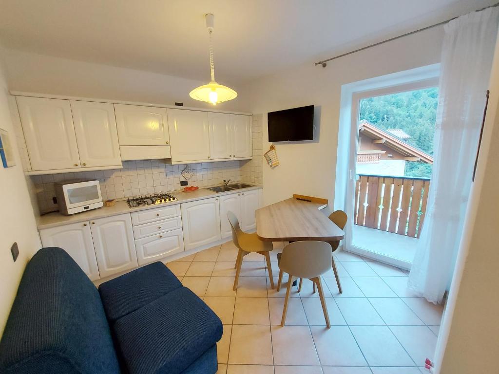 Kuchyň nebo kuchyňský kout v ubytování Residenza Arnica