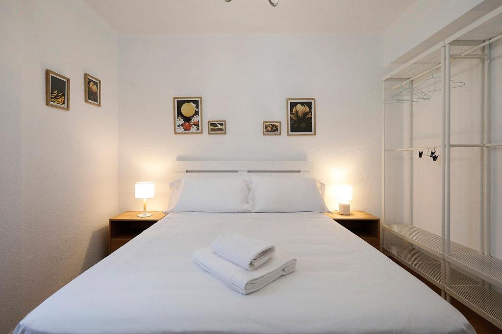 Ένα ή περισσότερα κρεβάτια σε δωμάτιο στο Oleta 9 Acogedor apartamento en San Sebastian