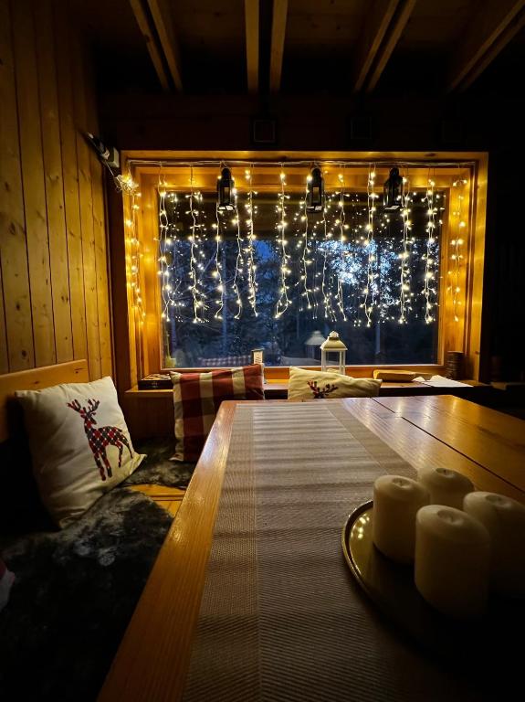 Posedenie v ubytovaní ~Chalet_Rifugio tra i boschi~