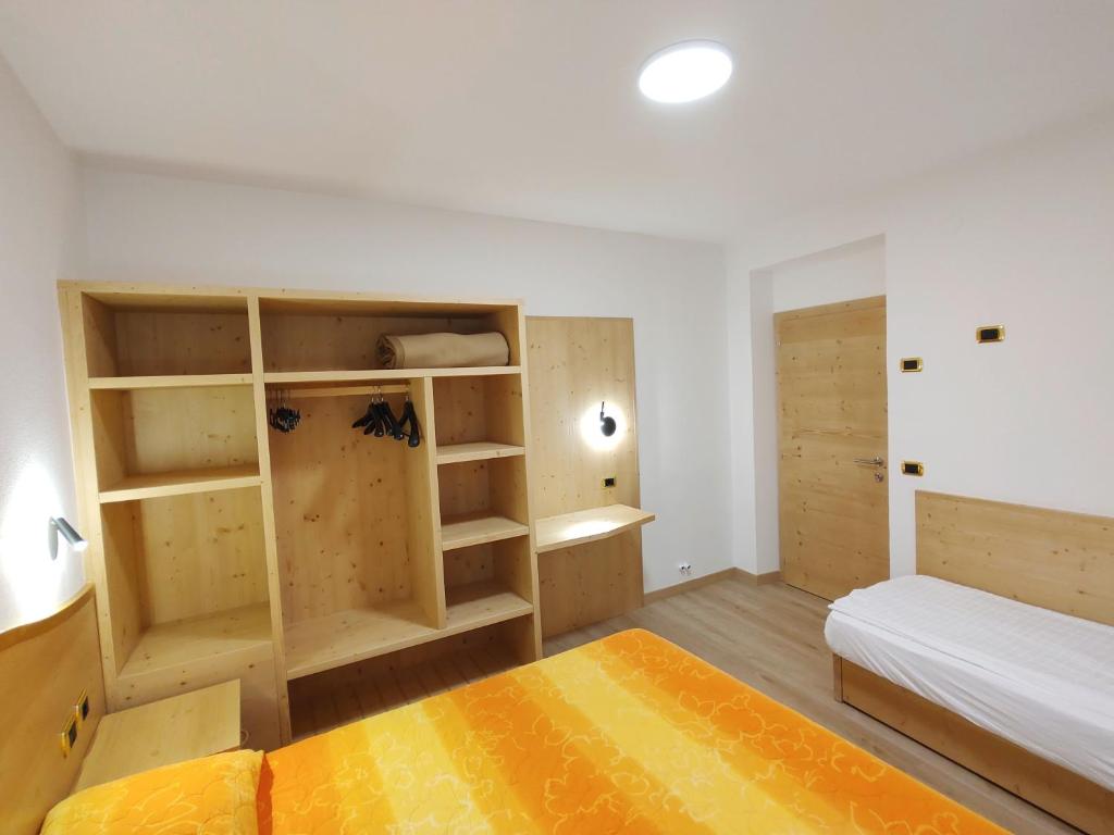 Postel nebo postele na pokoji v ubytování Residenza Arnica