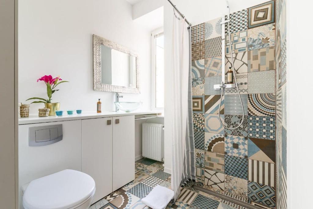 Kúpeľňa v ubytovaní Kopernika 4 - Studio Apartment by Noclegi Renters