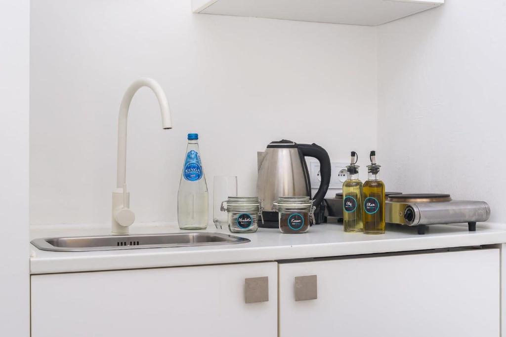 Kuchyňa alebo kuchynka v ubytovaní Kopernika 4 - Studio Apartment by Noclegi Renters