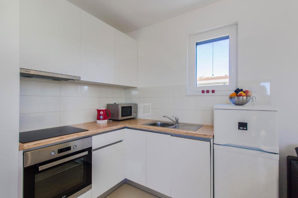 Kuchyň nebo kuchyňský kout v ubytování Apartnent Zorka1