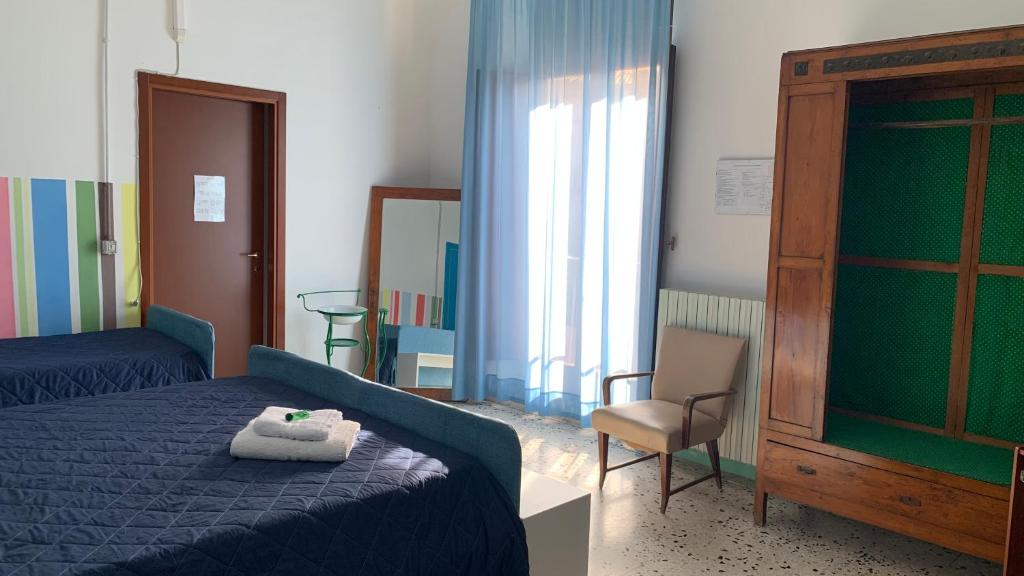 Letto o letti in una camera di Casa di Chiara