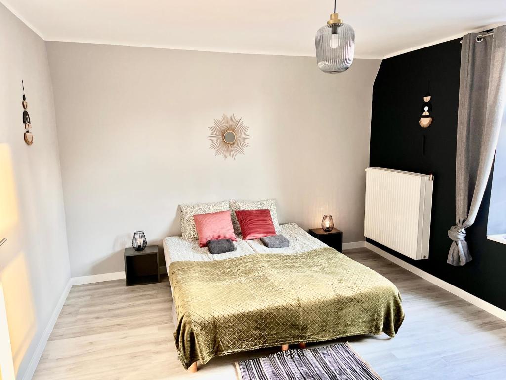 En eller flere senge i et værelse på My Old Town Gdańsk - Apartament dwupoziomowy Długa 56