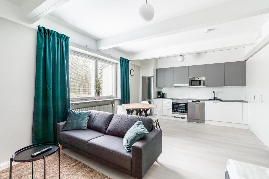 Un lugar para sentarse en Spot Apartments Hyrylä