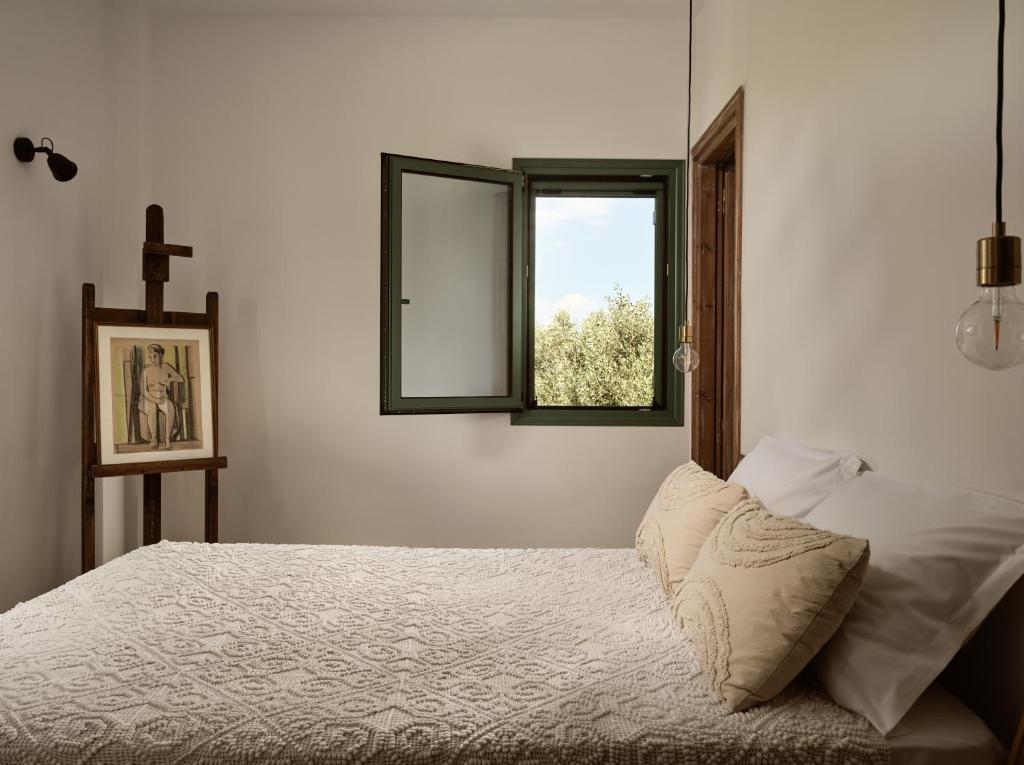 Posteľ alebo postele v izbe v ubytovaní PHI Simple Living Quarters