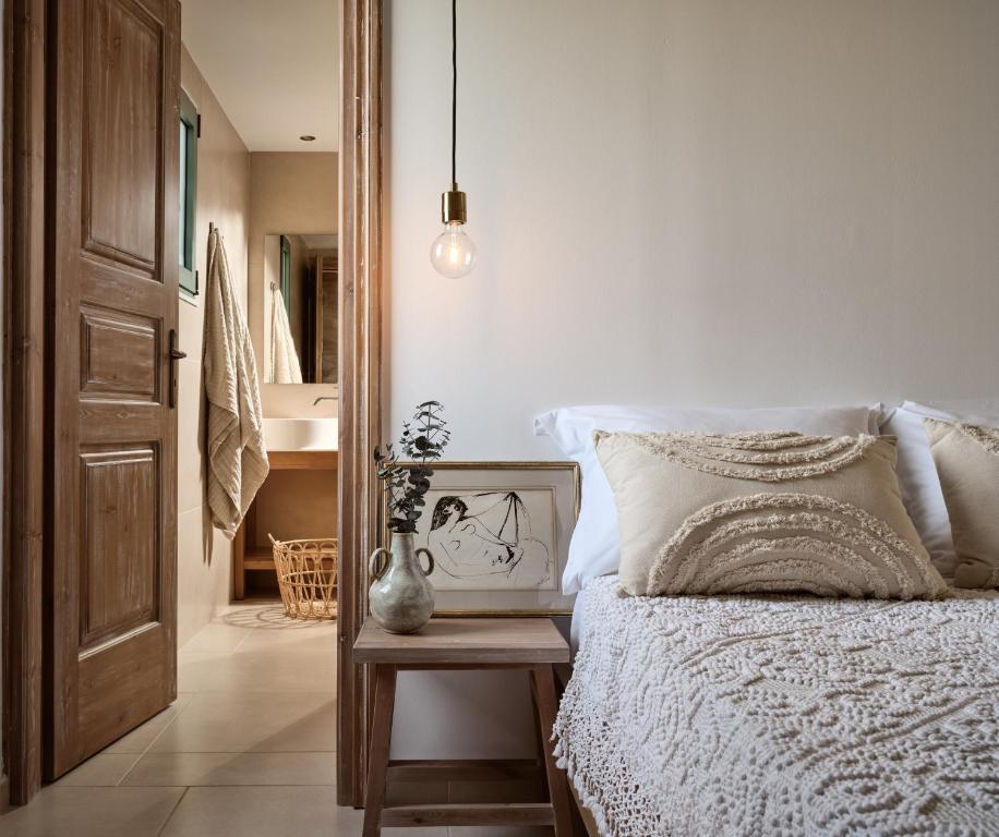 Posteľ alebo postele v izbe v ubytovaní PHI Simple Living Quarters