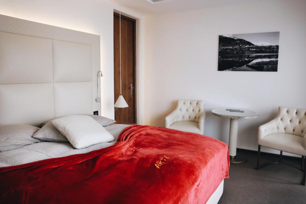 Postel nebo postele na pokoji v ubytování Hotel Arte