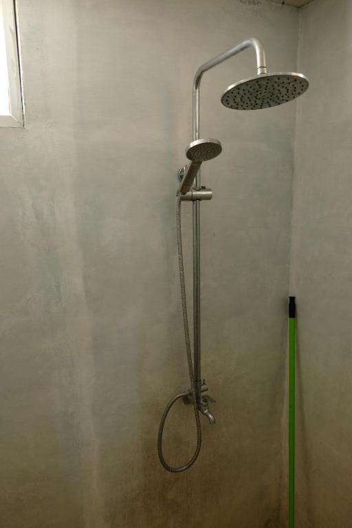 Koupelna v ubytování MENAKA HOMESTAY