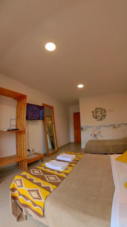 Postel nebo postele na pokoji v ubytování Casa Boutique QX- Pachacamac