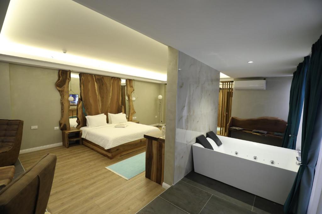 Postel nebo postele na pokoji v ubytování Hotel 1 Maji