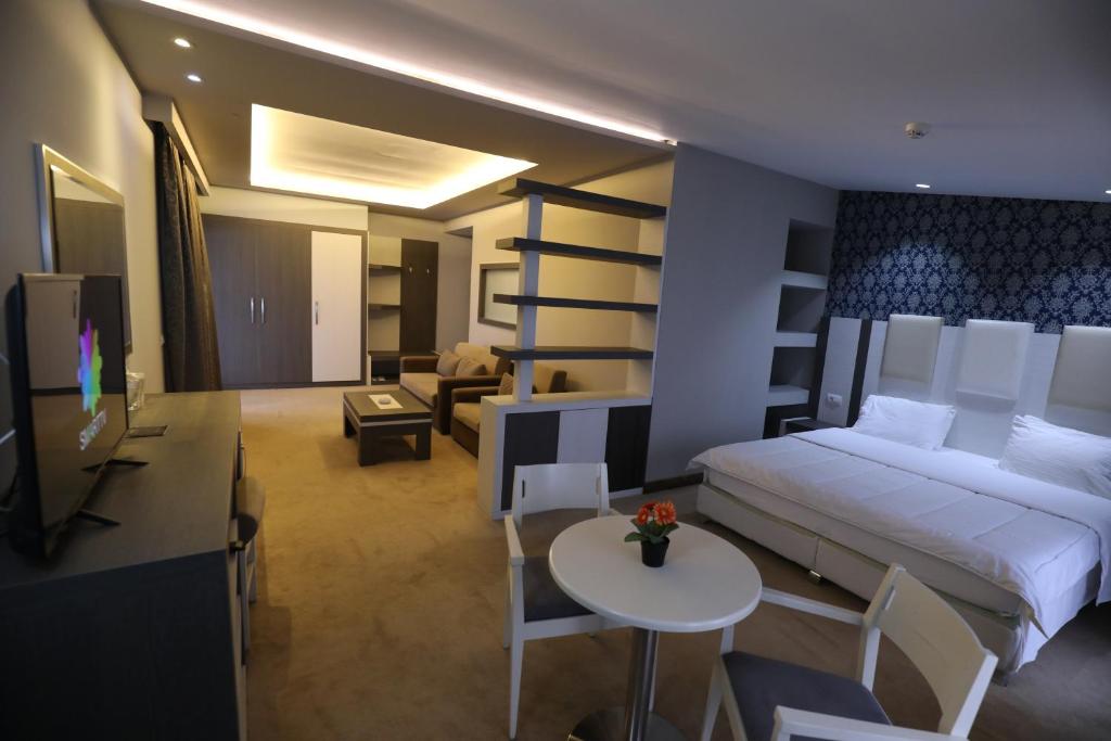 Postel nebo postele na pokoji v ubytování Hotel 1 Maji