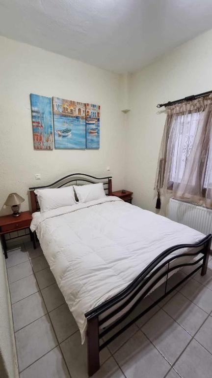 Posteľ alebo postele v izbe v ubytovaní Obrava Guesthouse Kotroni Trikalon