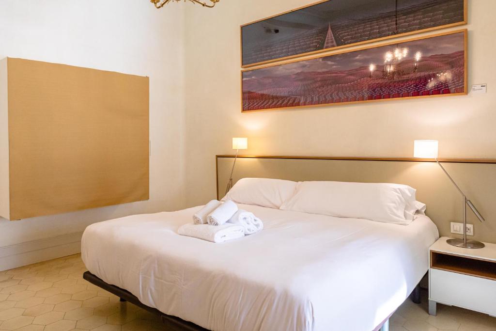 Posteľ alebo postele v izbe v ubytovaní B&B Boutique Ca La Maria