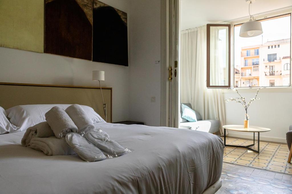 Posteľ alebo postele v izbe v ubytovaní B&B Boutique Ca La Maria