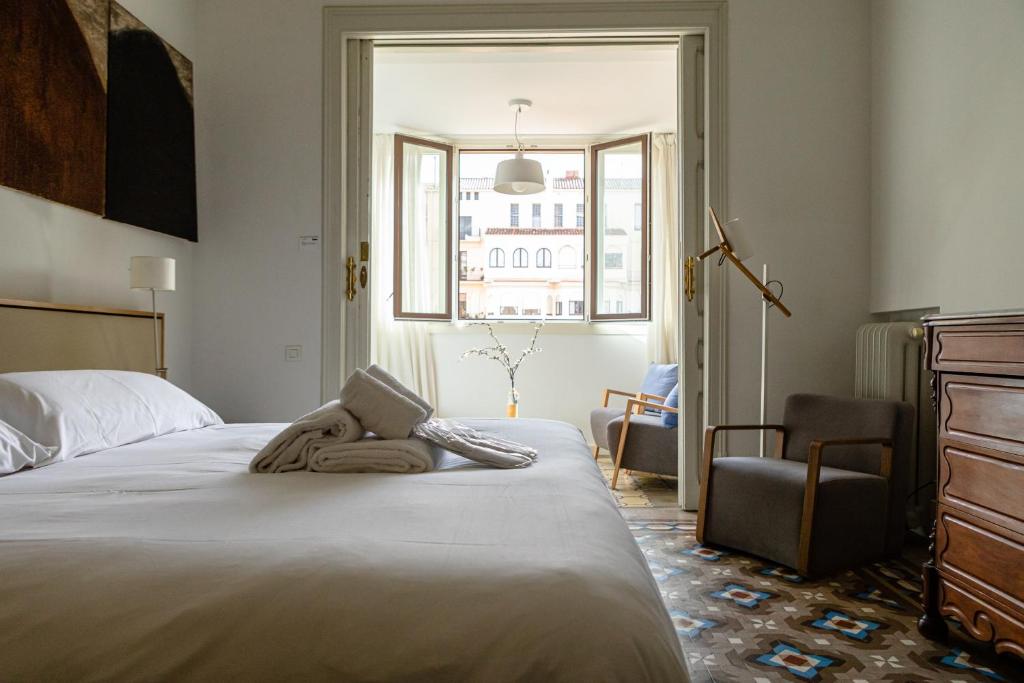 Posteľ alebo postele v izbe v ubytovaní B&B Boutique Ca La Maria