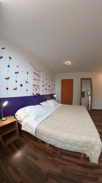 Postel nebo postele na pokoji v ubytování Casa Boutique QX- Pachacamac