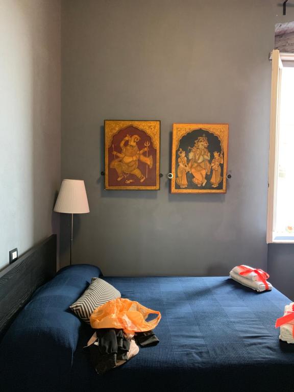 Postel nebo postele na pokoji v ubytování Corridoni Suites