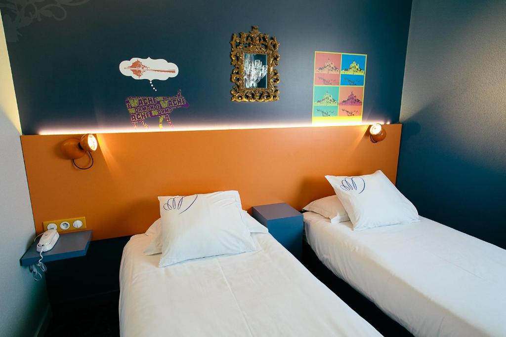 Postel nebo postele na pokoji v ubytování Hotel Gabriel