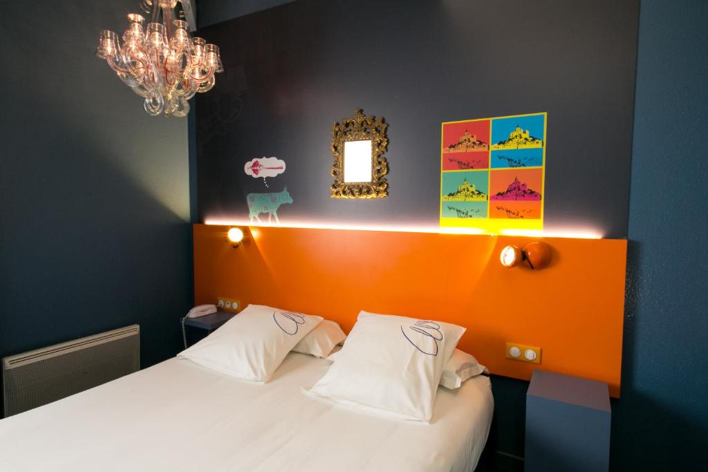 Postel nebo postele na pokoji v ubytování Hotel Gabriel