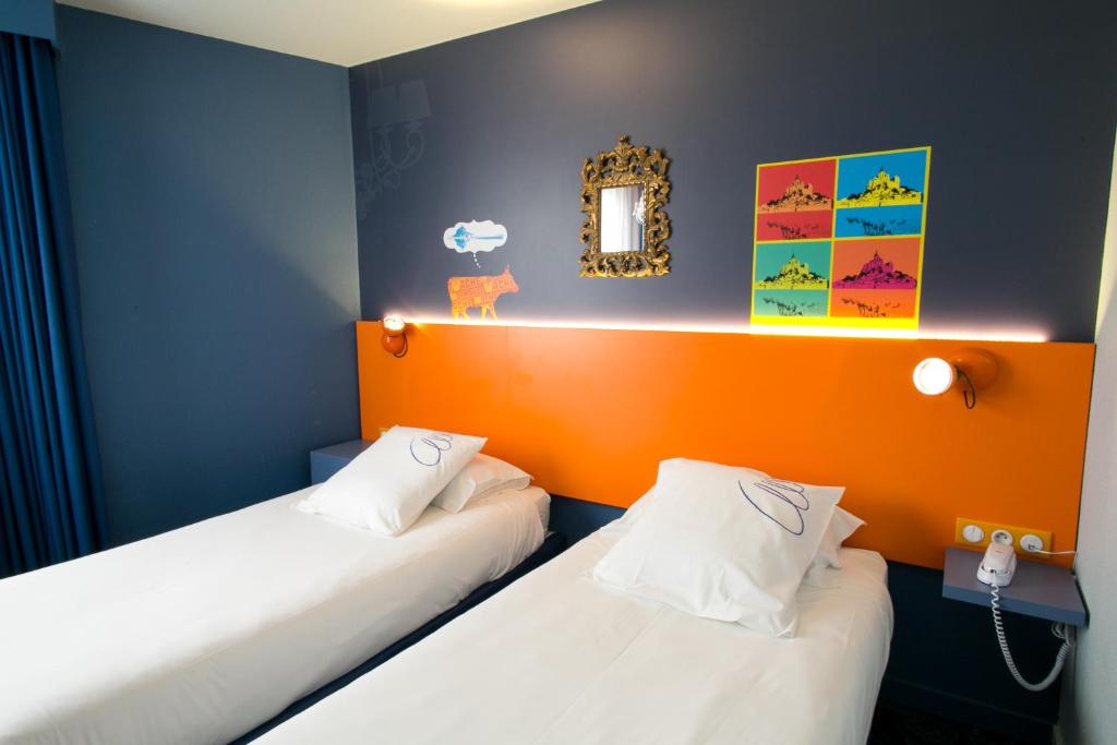 Postel nebo postele na pokoji v ubytování Hotel Gabriel