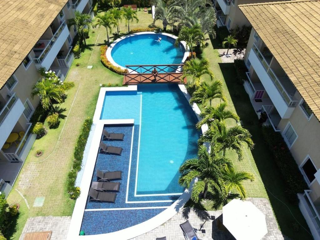 A view of the pool at Guarajuba-Village de Alexandre. Praia e Piscina! or nearby