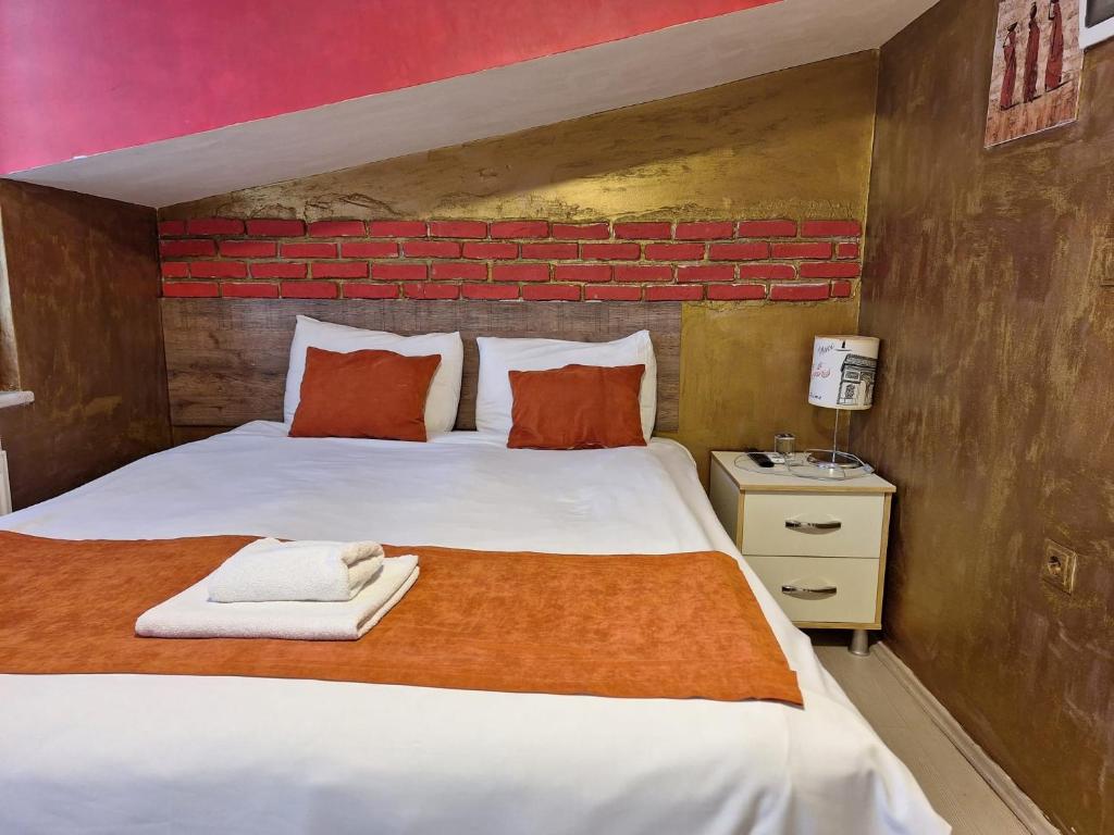 Postel nebo postele na pokoji v ubytování ADOR TROIA HOTEL