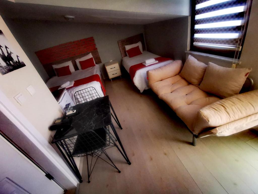 Posezení v ubytování ADOR TROIA HOTEL