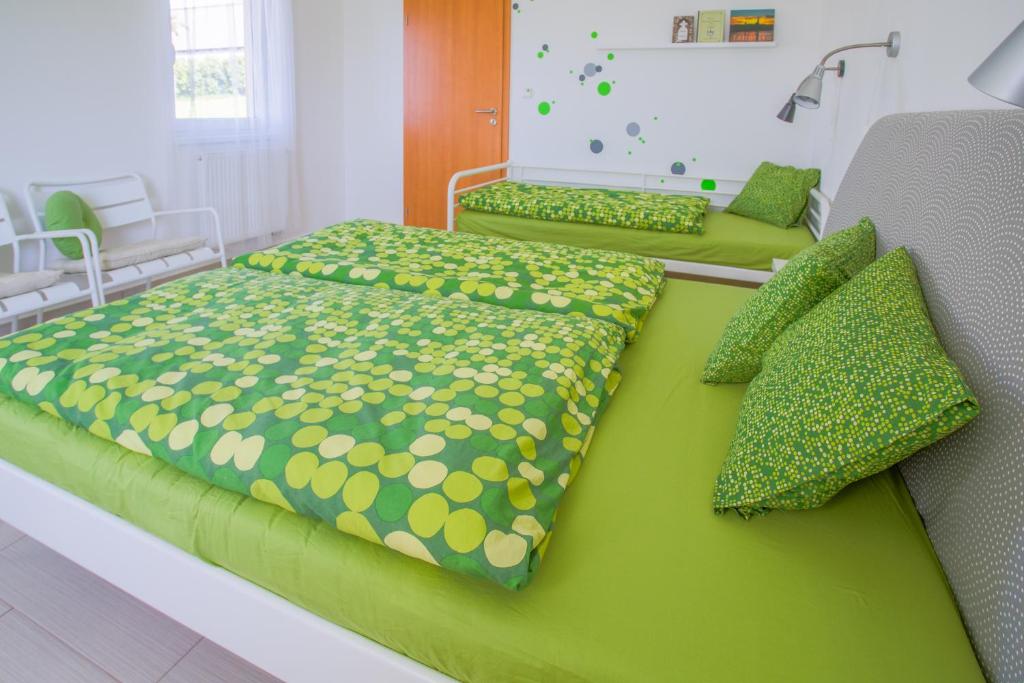 Postel nebo postele na pokoji v ubytování Apartment Zelená zahrada