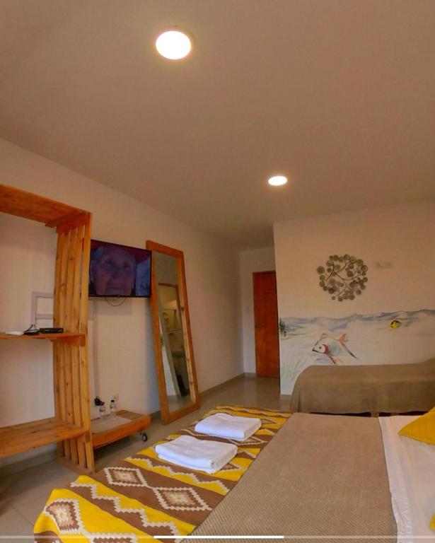 Postel nebo postele na pokoji v ubytování Casa Boutique QX- Pachacamac