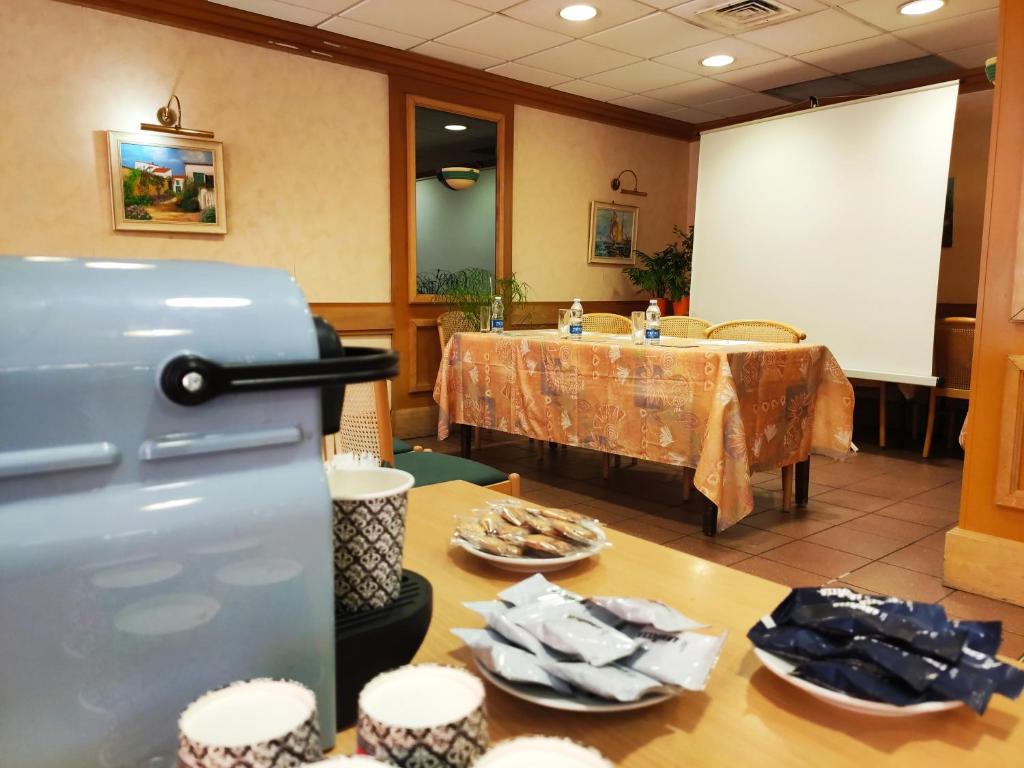 Postel nebo postele na pokoji v ubytování Hôtel Hélianthe