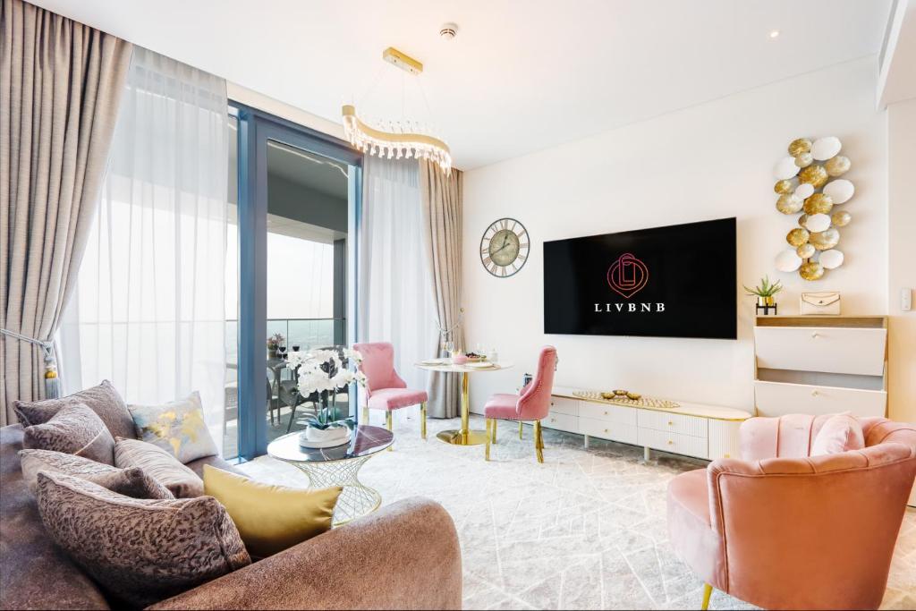 Posezení v ubytování Livbnb - Luxury 1 BR in Address Beach Residences