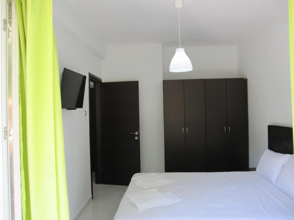 Posteľ alebo postele v izbe v ubytovaní Metamorfosis Apartments