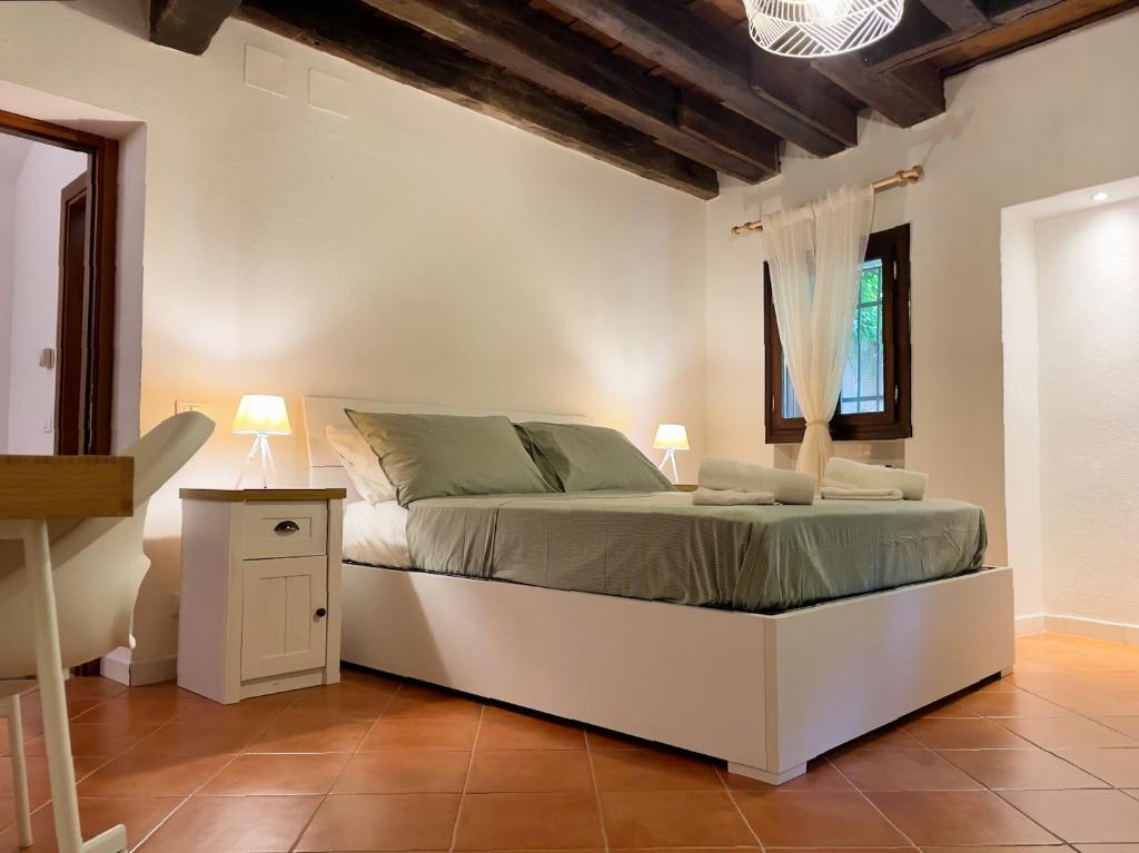 Кровать или кровати в номере Casa Alleria Venezia