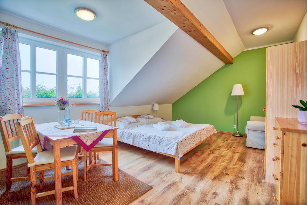 Postel nebo postele na pokoji v ubytování Penzion Pivnice - Jítravský Dvorec