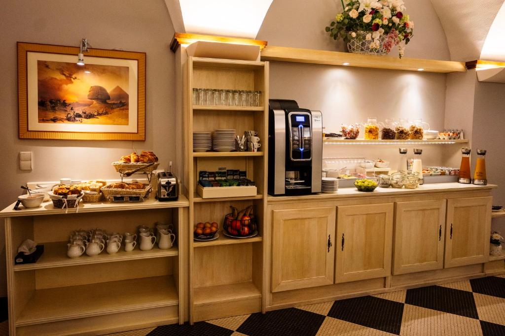 Kuchyň nebo kuchyňský kout v ubytování Cit'Hotel Sphinx - Hotel
