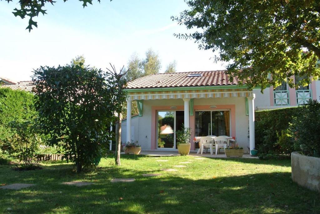 Κήπος έξω από το Biscarrosse Lac Navarrosse Duplex avec mezzanine classé 1 étoile