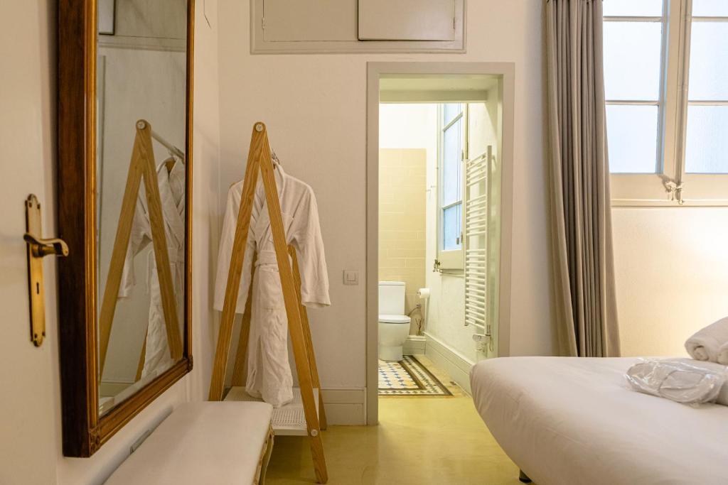 Posteľ alebo postele v izbe v ubytovaní B&B Boutique Ca La Maria