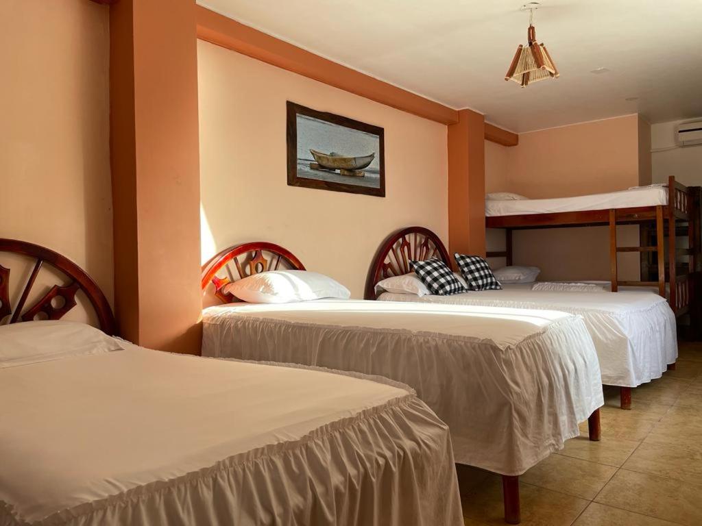 Postel nebo postele na pokoji v ubytování Hotel La Barca