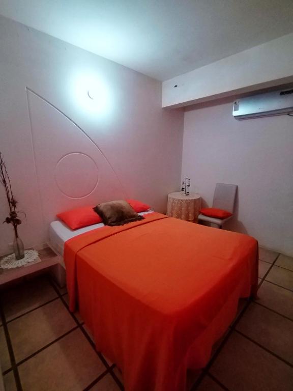 Postel nebo postele na pokoji v ubytování Hotel Cocos