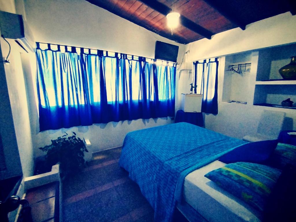 Postel nebo postele na pokoji v ubytování Hotel Cocos