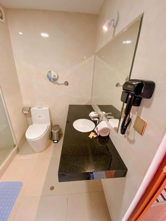 Koupelna v ubytování SM HOTEL Plus