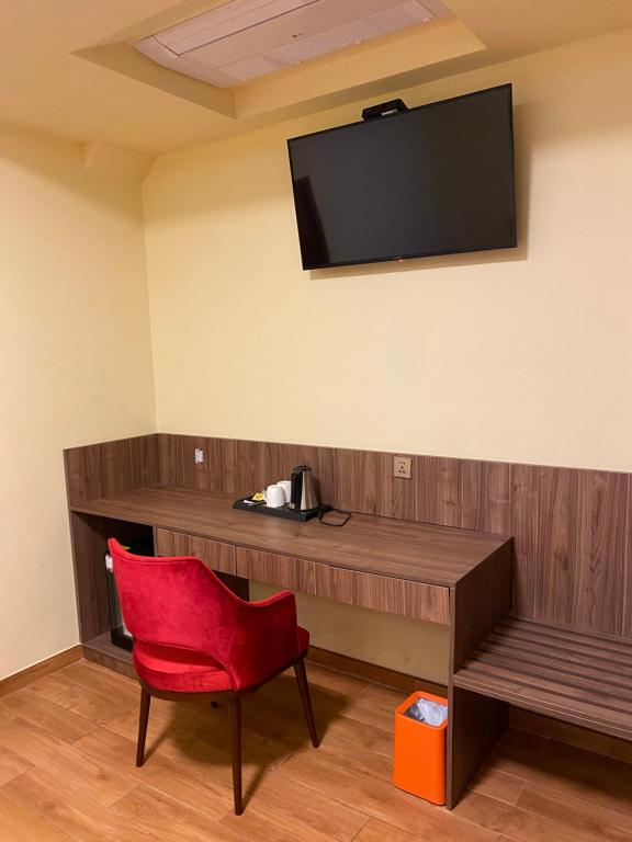 TV a/nebo společenská místnost v ubytování SM HOTEL Plus