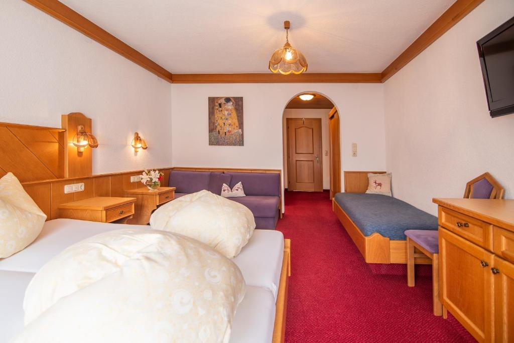 TV a/nebo společenská místnost v ubytování Haus Angela