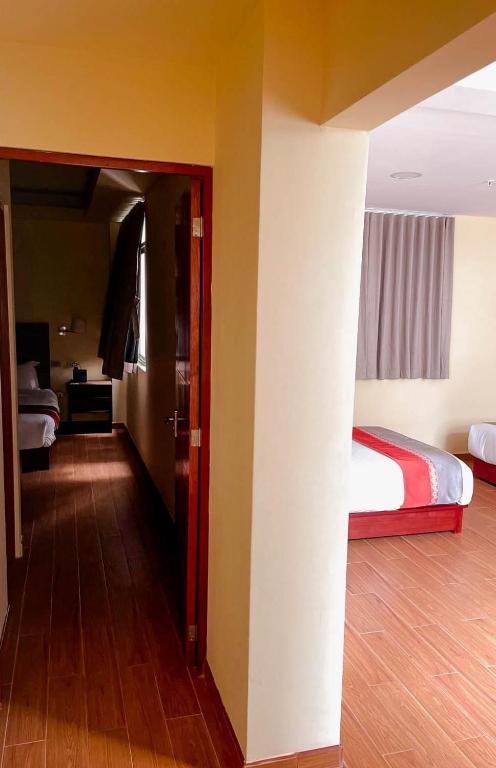 Postel nebo postele na pokoji v ubytování SM HOTEL Plus