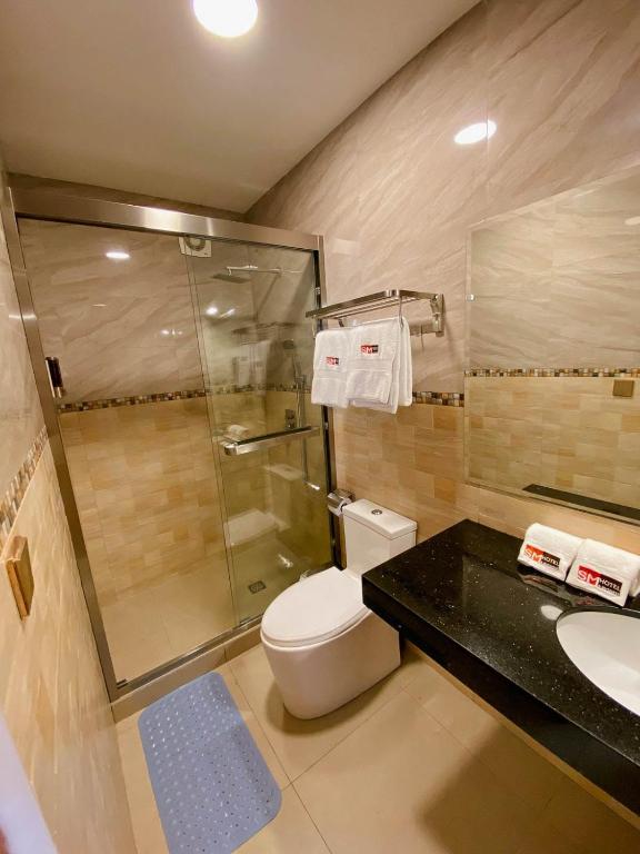 Koupelna v ubytování SM HOTEL Plus