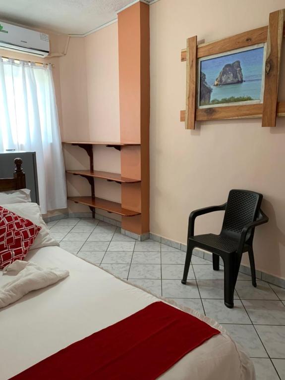 Postel nebo postele na pokoji v ubytování Hotel La Barca